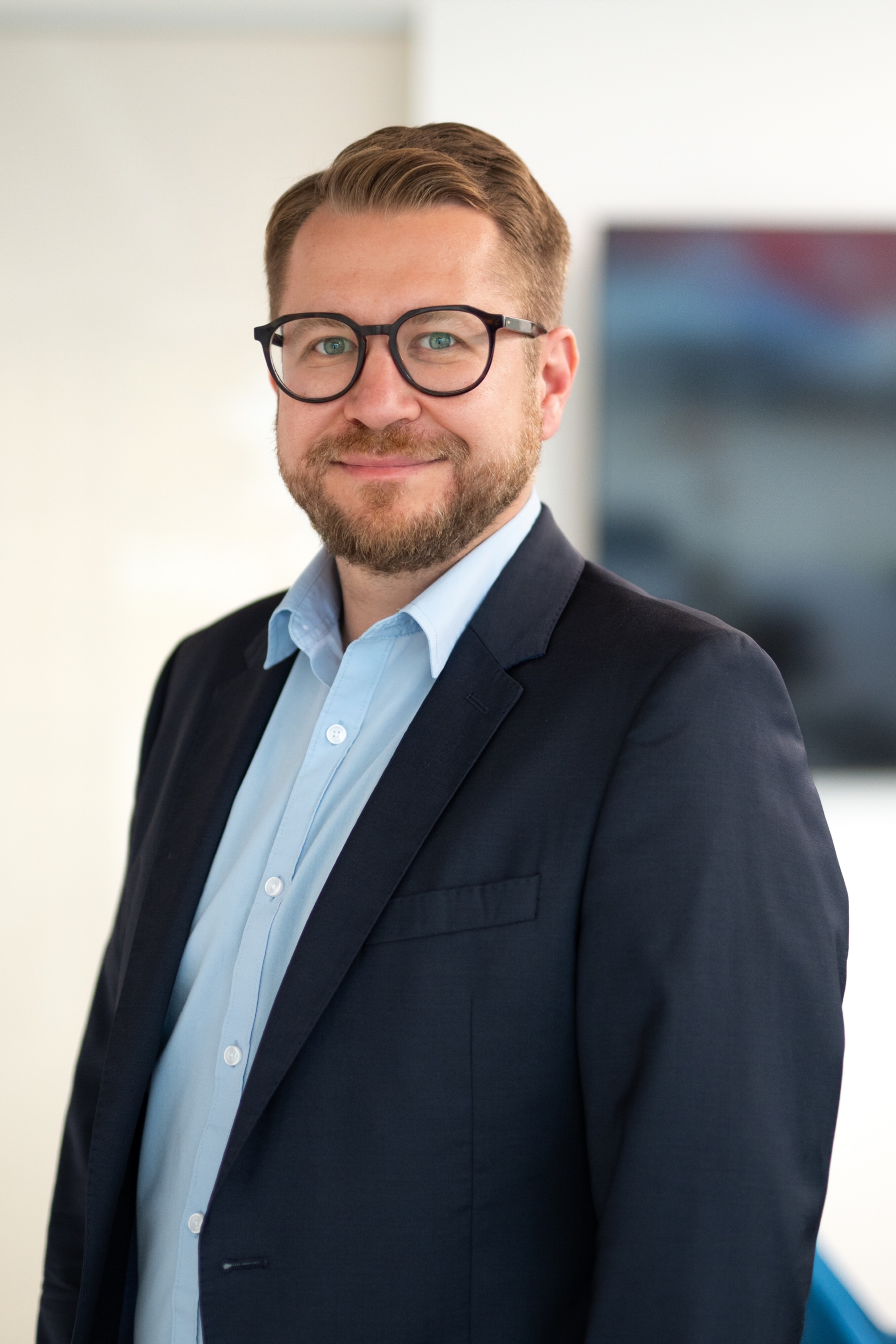 Firmenfotoshooting Beispiel – Actionaufnahme Mitarbeiter bei der Arbeit